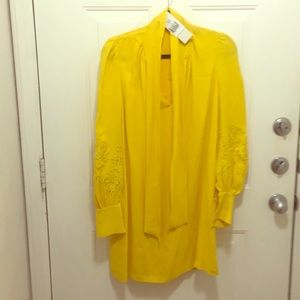 A dress. Bright yellow beautiful dress.